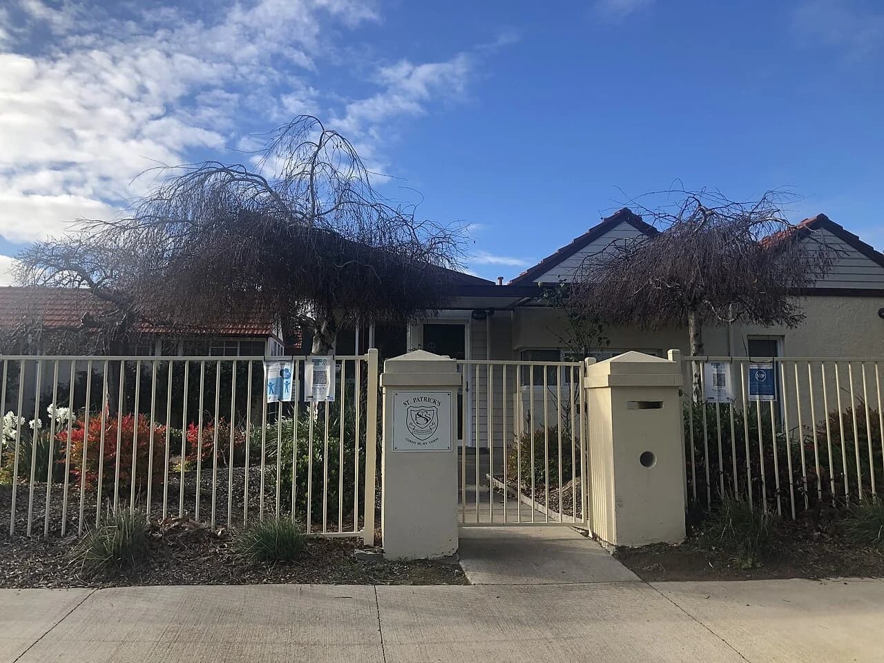 School building and entrance at St Patrick's School in Stratford, Victoria.