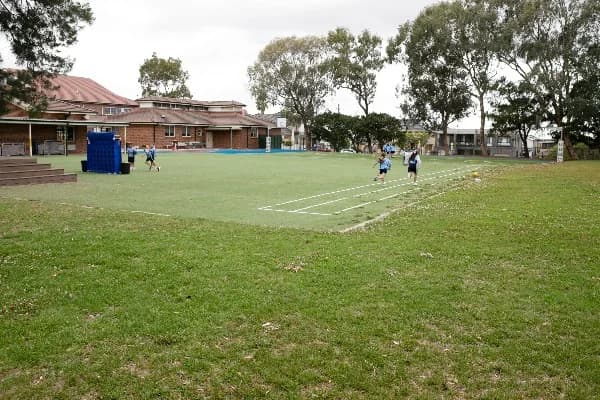 Campus buildings and grounds at St John Vianney Catholic Primary School in Greenacre