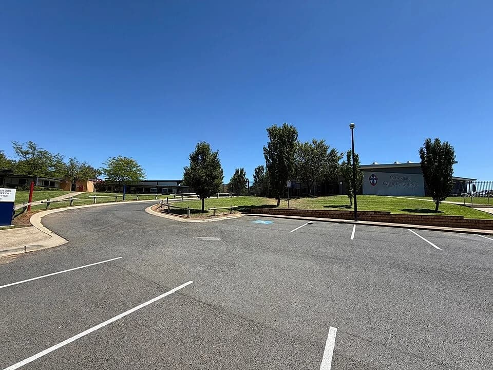 Entrance drive and campus buildings at Mater Dei Catholic College in Lake Albert